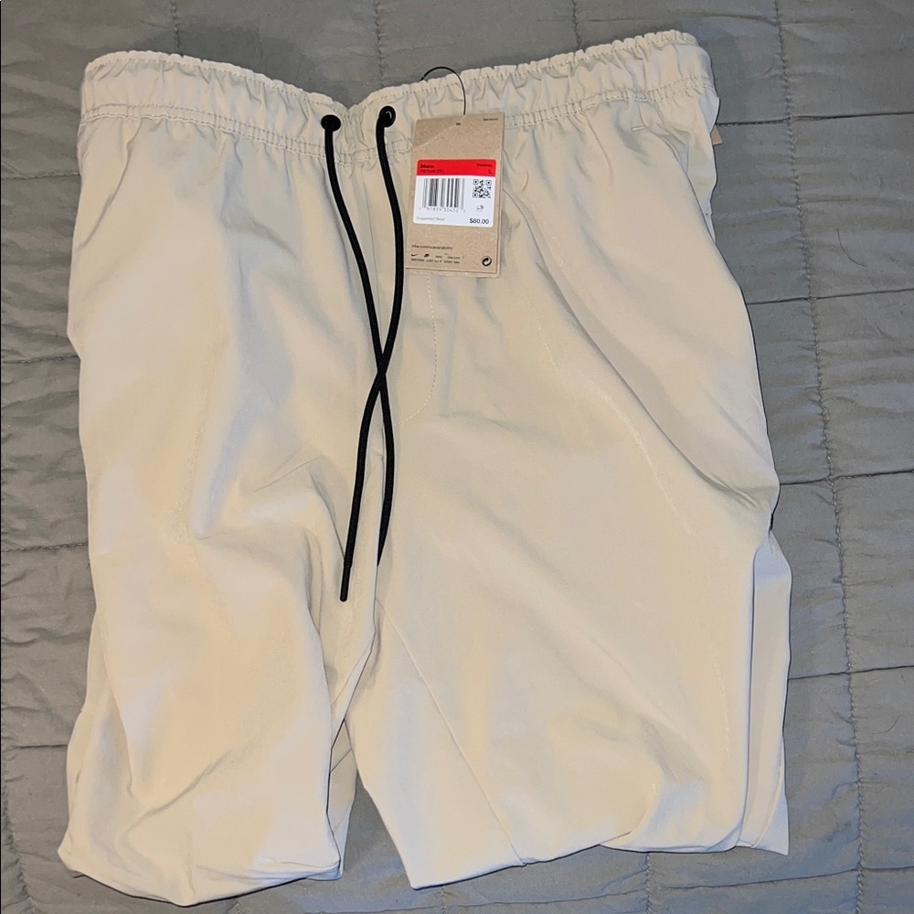 NWT! NIKE BEIGE TRAINING ANKLE PANT
